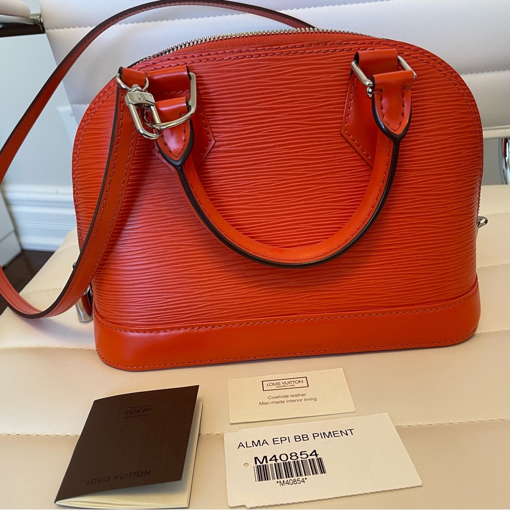 ❌SOLD❌Orange Minnesota Authentic Louis Vuitton Purse Nano Alma BB with dust bag
